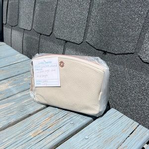 Dagne Dover makeup bag in large color bone leather